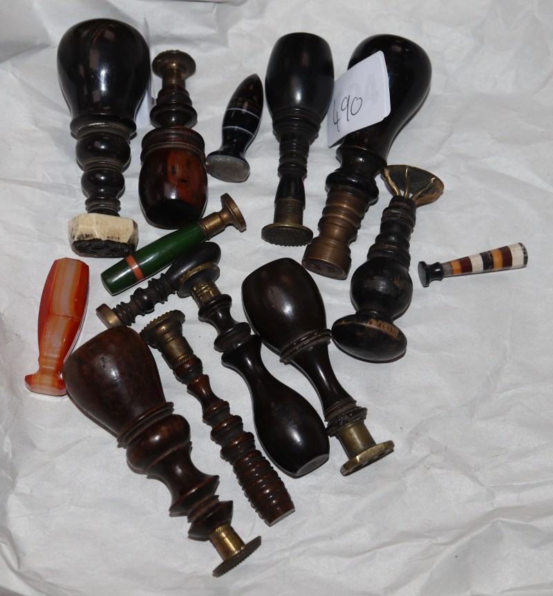 Nine 19th century ebony handled desk seals and others